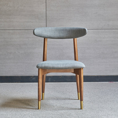 Modern Minimalist Dining Chair Curved Back Design Brass Leg Caps Fabric/Leather Upholstery for Dining & Living Spaces