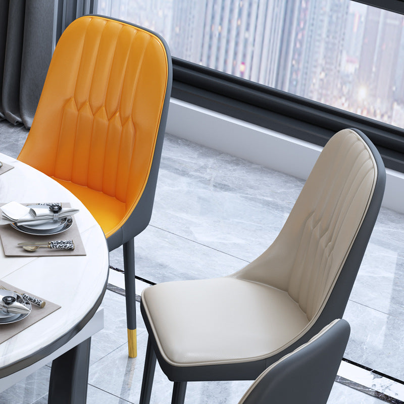 Luxury Contrast Dining Chair Stitched Back Detail Gold-Accent Legs & Leather Upholstery for Modern Dining Spaces