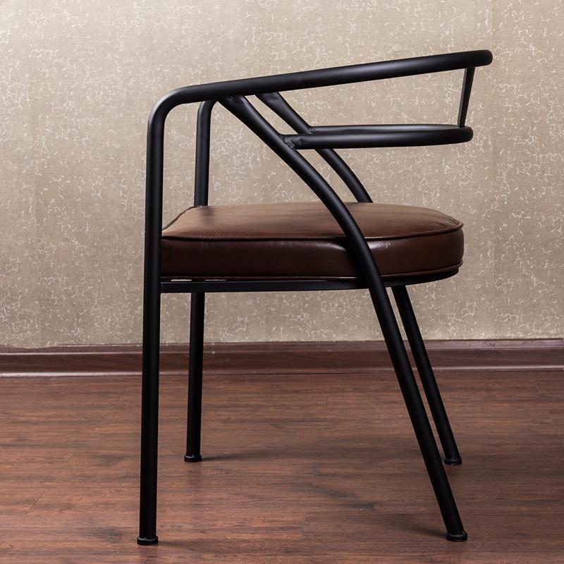 Modern Industrial Armchair Black Metal Frame Brown Leather Cushion & Curved Arm Design